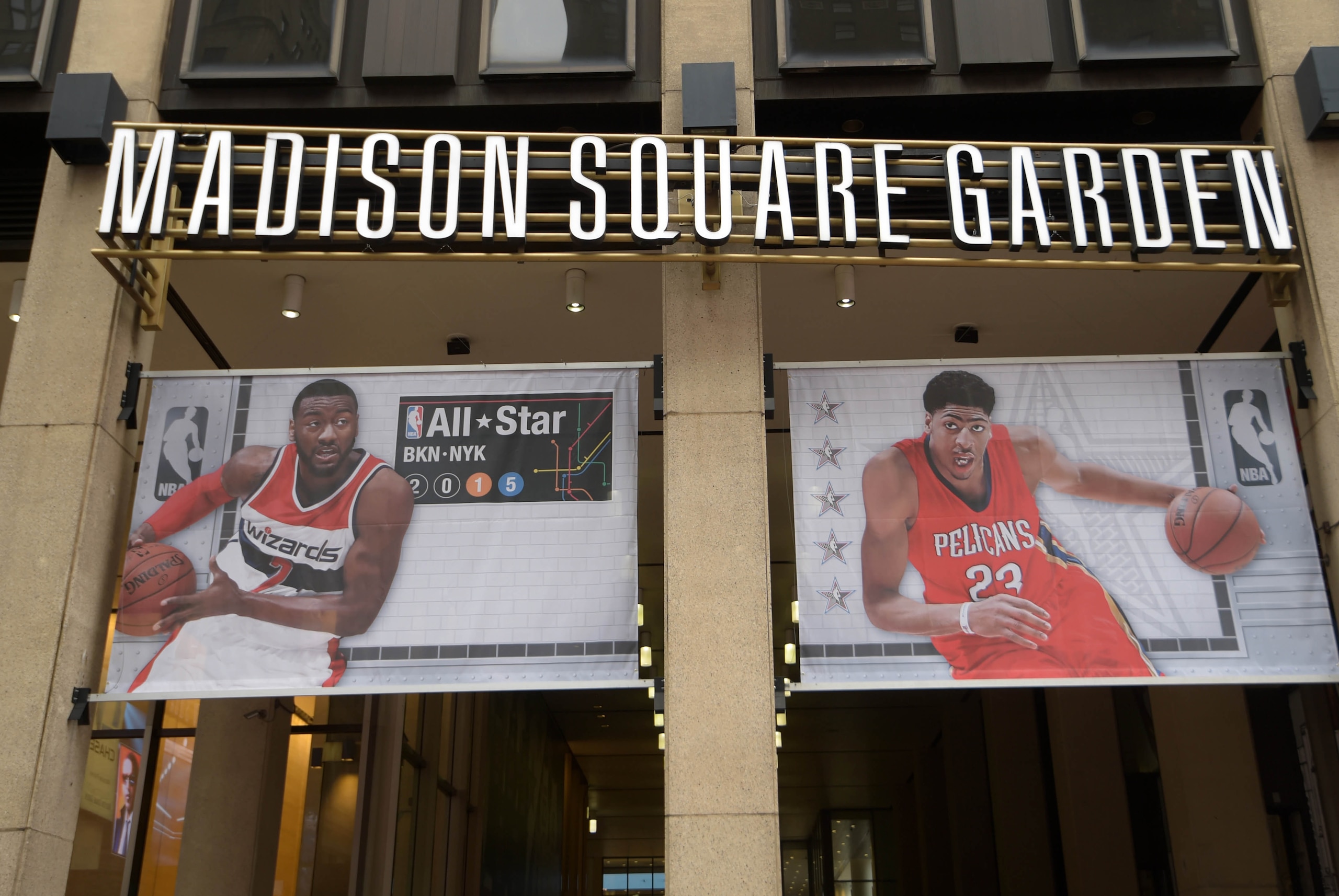 Feb 14, 2015; New York, NY, USA; General view of banners of Washington Wizards guard John Wall (left) and New Orleans Pelicans forward Anthony Davis at the entrance to Madison Square Garden in advance of the 2015 NBA All Star Game. Mandatory Credit: Kirby Lee-USA TODAY Sports