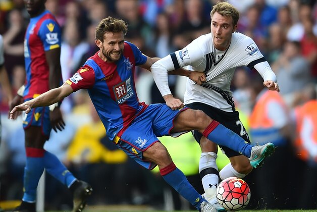 Crystal Palace's French midfielder Yohan Cabaye (L) vies with Tottenham Hotspur's Danish midfielder Christian Eriksen (R) during the English Premier League football match between Tottenham Hotspur and Crystal Palace at White Hart Lane in north London on September 20, 2015. AFP PHOTO / BEN STANSALL  RESTRICTED TO EDITORIAL USE. No use with unauthorized audio, video, data, fixture lists, club/league logos or 'live' services. Online in-match use limited to 75 images, no video emulation. No use in betting, games or single club/league/player publications.        (Photo credit should read BEN STANSALL/AFP/Getty Images)