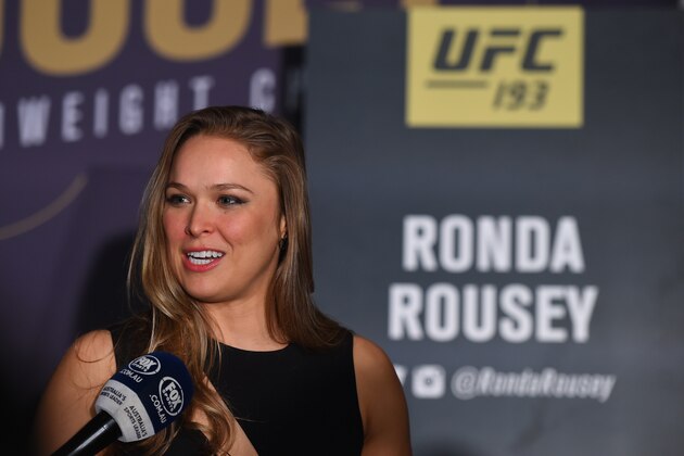 MELBOURNE, AUSTRALIA - NOVEMBER 13:  UFC women's bantamweight champion Ronda Rousey of the United States interacts with media during the UFC 193 Ultimate Media Day festivities at Etihad Stadium on November 13, 2015 in Melbourne, Australia. (Photo by Josh Hedges/Zuffa LLC/Zuffa LLC via Getty Images)