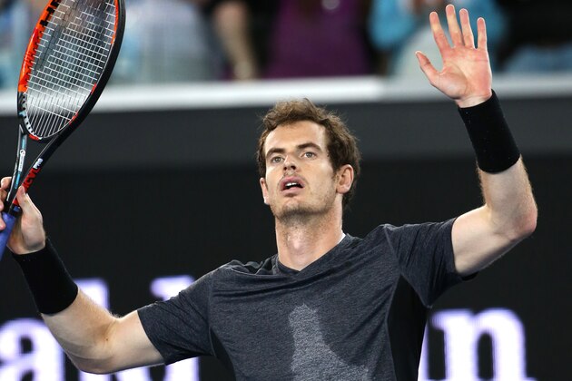 Andy Murray of Britain celebrates after defeating Joao Sousa of Portugal during their third round match at the Australian Open tennis championships in Melbourne, Australia, Saturday, Jan. 23, 2016.(AP Photo/Rick Rycroft)