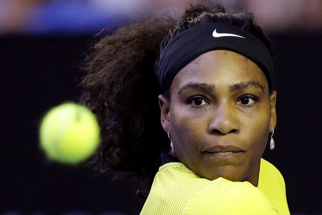 Serena Williams of the United States eyes the ball as she returns to Daria Kasatkina of Russia during their third round match at the Australian Open tennis championships in Melbourne, Australia, Friday, Jan. 22, 2016.(AP Photo/Aaron Favila)