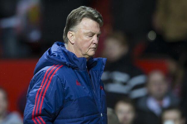 Manchester United's manager Louis van Gaal walks from the pitch after his team's 1-0 loss during the English Premier League soccer match between Manchester United and Southampton at Old Trafford Stadium, Manchester, England, Saturday, Jan. 23, 2016. (AP Photo/Jon Super)