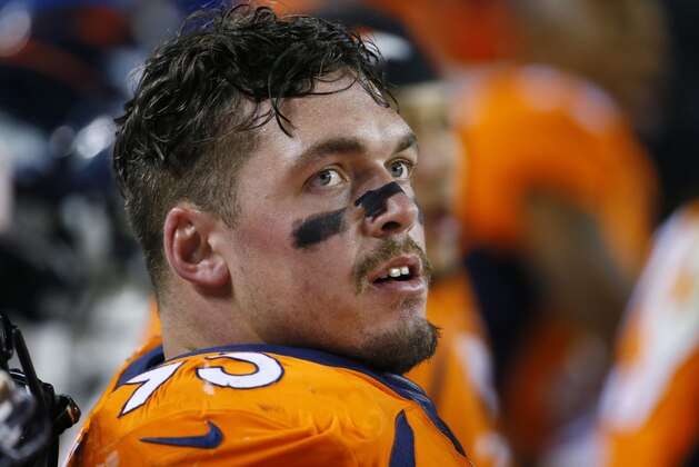 Denver Broncos defensive end Derek Wolfe looks on during an NFL football game between the Denver Broncos and the Kansas City Chiefs, Sunday, Nov. 15, 2015, in Denver. (AP Photo/Jack Dempsey)