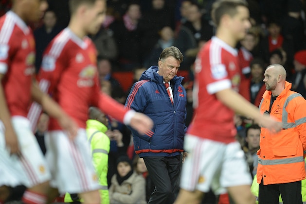 Manchester United's Dutch manager Louis van Gaal (C) leaves the pitch at full-time during the English Premier League football match between Manchester United and Southampton at Old Trafford in Manchester, north west England, on January 23, 2016. AFP PHOTO / OLI SCARFF

RESTRICTED TO EDITORIAL USE. No use with unauthorized audio, video, data, fixture lists, club/league logos or 'live' services. Online in-match use limited to 75 images, no video emulation. No use in betting, games or single club/league/player publications. / AFP / OLI SCARFF        (Photo credit should read OLI SCARFF/AFP/Getty Images)