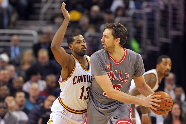 Jan 23, 2016; Cleveland, OH, USA; Chicago Bulls center Pau Gasol (16) looks to pass the ball as Cleveland Cavaliers center Tristan Thompson (13) defends during the first quarter at Quicken Loans Arena. Mandatory Credit: Ken Blaze-USA TODAY Sports