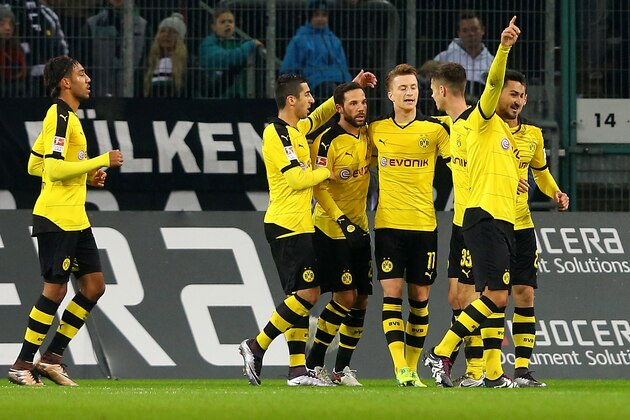 MOENCHENGLADBACH, GERMANY - JANUARY 23:  Marco Reus of Dortmund celebrates the first goal with his team mates during the Bundesliga match between Borussia Moenchengladbach and Borussia Dortmund at Borussia-Park on January 23, 2016 in Moenchengladbach, Germany.  (Photo by Christof Koepsel/Getty Images For MAN)