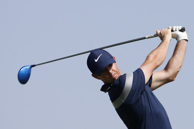 Rory McIlroy of Northern Ireland plays a shot during the final of the Abu Dhabi Golf Championship in the capital of the United Arab Emirates on January 24, 2016. / AFP / KARIM SAHIB        (Photo credit should read KARIM SAHIB/AFP/Getty Images)