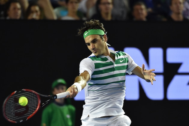 Switzerland's Roger Federer plays a forehand return during his men's singles match against Belgium's David Goffin on day seven of the 2016 Australian Open tennis tournament in Melbourne on January 24, 2016. AFP PHOTO / SAEED KHAN-- IMAGE RESTRICTED TO EDITORIAL USE - STRICTLY NO COMMERCIAL USE / AFP / SAEED KHAN        (Photo credit should read SAEED KHAN/AFP/Getty Images)