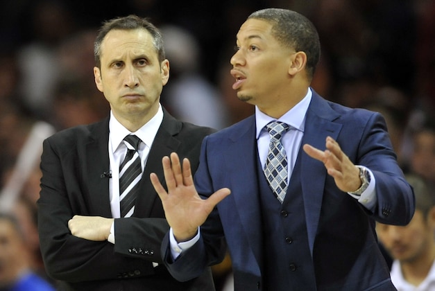 Oct 30, 2014; Cleveland, OH, USA; Cleveland Cavaliers head coach David Blatt (left) and assistant coach Tyronn Lue stand near the bench against the New York Knicks at Quicken Loans Arena. New York won 95-90. Mandatory Credit: David Richard-USA TODAY Sports