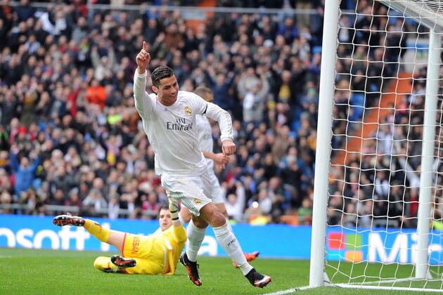 MADRID, SPAIN - JANUARY 17: Cristiano Ronaldo of Real Madrid celebrates after scoring his team's 4th goal during the La Liga match between Real Madrid CF and Sporting Gijon at Estadio Santiago Bernabeu on January 17, 2016 in Madrid, Spain. (Photo by Denis Doyle/Getty Images) MADRID, SPAIN - JANUARY 17: Cristiano Ronaldo of Real Madrid celebrates after scoring his team's 4th goal during the La Liga match between Real Madrid CF and Sporting Gijon at Estadio Santiago Bernabeu on January 17, 2016 in Madrid, Spain. (Photo by Denis Doyle/Getty Images)