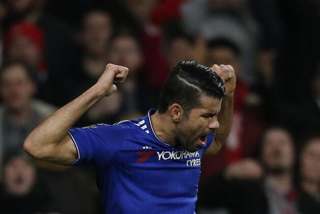 Chelsea's Brazilian-born Spanish striker Diego Costa celebrates after scoring the opening goal of the English Premier League football match between Arsenal and Chelsea at the Emirates Stadium in London on January 24, 2016. AFP PHOTO / IKIMAGES

RESTRICTED TO EDITORIAL USE. No use with unauthorized audio, video, data, fixture lists, club/league logos or 'live' services. Online in-match use limited to 75 images, no video emulation. No use in betting, games or single club/league/player publications. / AFP / IKIMAGES        (Photo credit should read IKIMAGES/AFP/Getty Images)