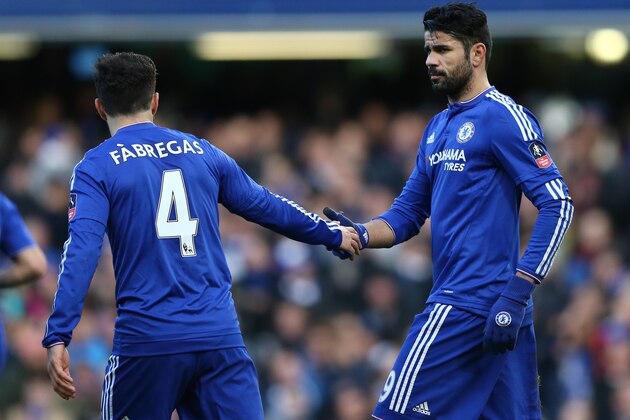 Chelsea's Brazilian-born Spanish striker Diego Costa (R) celebrates with Chelsea's Spanish midfielder Cesc Fabregas after scoring his team's first goal during the FA Cup third-round football match between Chelsea and Scunthorpe United at Stamford Bridge in London on January 10, 2016.    AFP PHOTO / JUSTIN TALLIS

RESTRICTED TO EDITORIAL USE. NO USE WITH UNAUTHORIZED AUDIO, VIDEO, DATA, FIXTURE LISTS, CLUB/LEAGUE LOGOS OR 'LIVE' SERVICES. ONLINE IN-MATCH USE LIMITED TO 75 IMAGES, NO VIDEO EMULATION. NO USE IN BETTING, GAMES OR SINGLE CLUB/LEAGUE/PLAYER PUBLICATIONS. / AFP / JUSTIN TALLIS        (Photo credit should read JUSTIN TALLIS/AFP/Getty Images)
