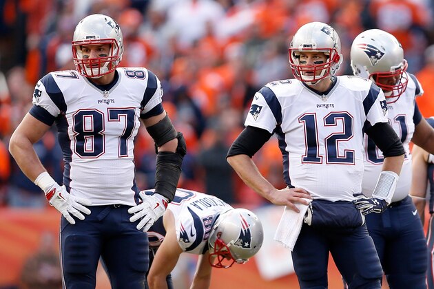 DENVER, CO - JANUARY 24: Rob Gronkowski #87 and Tom Brady #12 of the New England Patriots look on in the first half against the Denver Broncos in the AFC Championship game at Sports Authority Field at Mile High on January 24, 2016 in Denver, Colorado. (Photo by Christian Petersen/Getty Images) DENVER, CO - JANUARY 24: Rob Gronkowski #87 and Tom Brady #12 of the New England Patriots look on in the first half against the Denver Broncos in the AFC Championship game at Sports Authority Field at Mile High on January 24, 2016 in Denver, Colorado. (Photo by Christian Petersen/Getty Images)