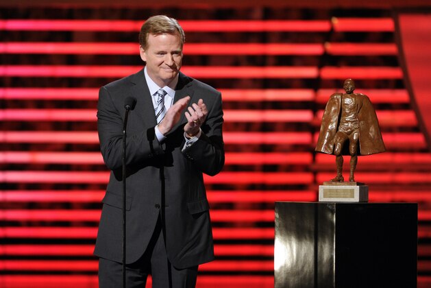 NFL Commissioner Roger Goodell presents the award for Walter Payton NFL  Man of the Year Award at 3rd annual NFL Honors at Radio City Music Hall on Saturday, Feb. 1, 2014, in New York. (Photo by Evan Agostini/Invision for NFL/AP Images)