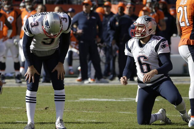 New England Patriots punter Ryan Allen (6) looks on as Patriots kicker Stephen Gostkowski reacts after missing an extra point following a touchdown by Steven Jackson during the first half the NFL football AFC Championship game between the Denver Broncos and the New England Patriots, Sunday, Jan. 24, 2016, in Denver. (AP Photo/Chris Carlson)