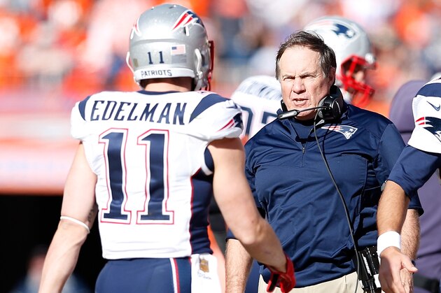 DENVER, CO - JANUARY 24: Head coach Bill Belichick of the New England Patriots speaks to Julian Edelman #11 in the first half against the Denver Broncos in the AFC Championship game at Sports Authority Field at Mile High on January 24, 2016 in Denver, Colorado.  (Photo by Christian Petersen/Getty Images)