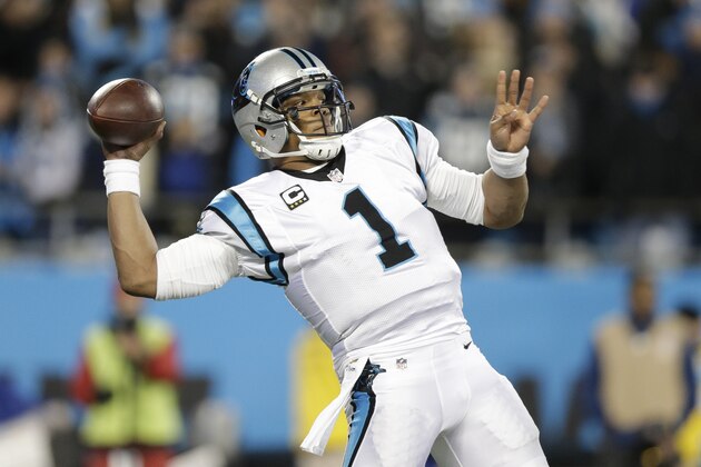 Carolina Panthers' Cam Newton throws during the first half the NFL football NFC Championship game against the Arizona Cardinals Sunday, Jan. 24, 2016, in Charlotte, N.C. (AP Photo/Chuck Burton)
