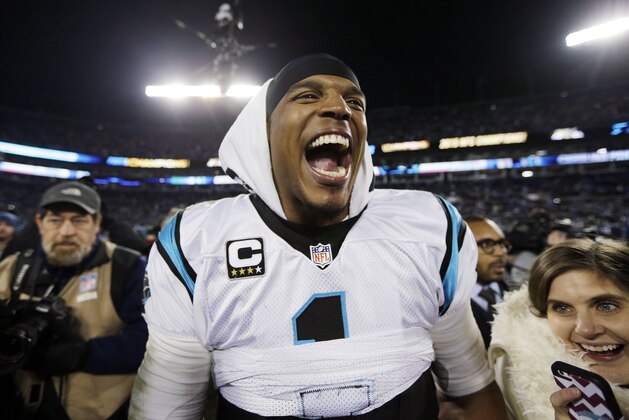 Carolina Panthers' Cam Newton celebrates after the NFL football NFC Championship game against the Arizona Cardinals, Sunday, Jan. 24, 2016, in Charlotte, N.C. The Panthers won 49-15 to advance to the Super Bowl. (AP Photo/Chuck Burton)