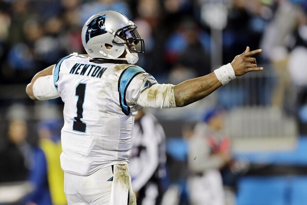 Carolina Panthers' Cam Newton- celebrates a first down pass during the second half the NFL football NFC Championship game against the Arizona Cardinals, Sunday, Jan. 24, 2016, in Charlotte, N.C. (AP Photo/David J. Phillip)