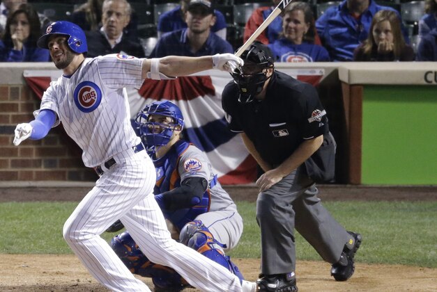 Chicago Cubs' Kris Bryant hits a two-run home run during the eighth inning of Game 4 of the National League baseball championship series against the New York Mets Wednesday, Oct. 21, 2015, in Chicago. (AP Photo/David Goldman)