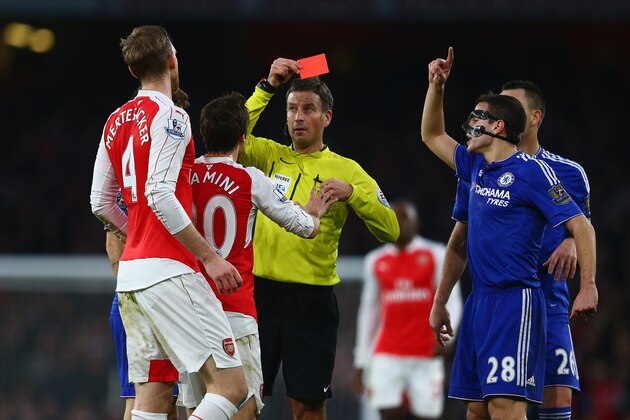 LONDON, ENGLAND - JANUARY 24:  Per Mertesacker of Arsenal is shown the red card and is sent off for his challenge on Diego Costa of Chelsea during the Barclays Premier League match between Arsenal and Chelsea at The Emirates Stadium on January 24, 2016 in London, England.  (Photo by Clive Mason/Getty Images)