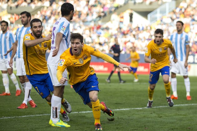 MALAGA, SPAIN - JANUARY 23: Lionel Messi of FC Barcelona celebrates scoring their second goal during the La Liga match between Malaga CF and FC Barcelona at La Rosaleda Stadium on January 23, 2016 in Malaga, Spain.  (Photo by Gonzalo Arroyo Moreno/Getty Images)
