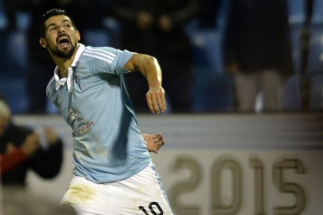 Celta Vigo's forward Nolito celebrates after scoring a goal during the Spanish league football match RC Celta de Vigo vs Real Sporting de Gijon at the Balaidos stadium in Vigo on November 28, 2015.   Celta won the match 2-1. AFP PHOTO/ MIGUEL RIOPA / AFP / MIGUEL RIOPA        (Photo credit should read MIGUEL RIOPA/AFP/Getty Images)