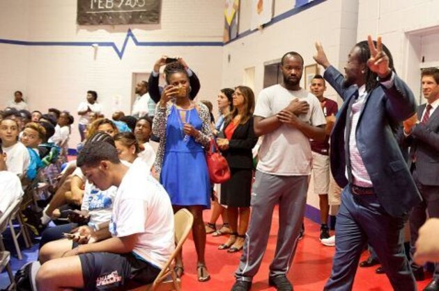 Kofi Kingston makes an appearance at a Boys and Girls Club.