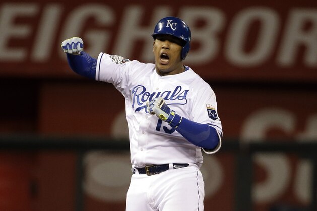 Kansas City Royals' Salvador Perez celebrates his double during the eighth inning of Game 2 of the Major League Baseball World Series against the New York Mets Wednesday, Oct. 28, 2015, in Kansas City, Mo. (AP Photo/David J. Phillip)
