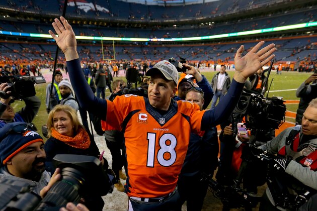 DENVER, CO - JANUARY 24:  Peyton Manning #18 of the Denver Broncos celebrates after defeating the New England Patriots in the AFC Championship game at Sports Authority Field at Mile High on January 24, 2016 in Denver, Colorado. The Broncos defeated the Patriots 20-18.  (Photo by Justin Edmonds/Getty Images)
