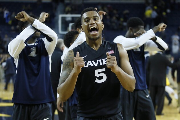 ANN ARBOR, MI - NOVEMBER 20:  Trevon Bluiett #5 of the Xavier Musketeers celebrates a 86-70 win over Michigan at Crisler Arena on November 20, 2015 in Ann Arbor, Michigan.  (Photo by Duane Burleson/Getty Images)