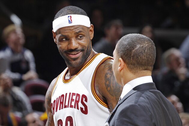 CLEVELAND, OH - NOVEMBER 23: LeBron James #23 and assistant coach Tyronn Lue of the Cleveland Cavaliers talk during the game against the Orlando Magic on November 23, 2015 at Quicken Loans Arena in Cleveland, Ohio. NOTE TO USER: User expressly acknowledges and agrees that, by downloading and or using this Photograph, user is consenting to the terms and condition of the Getty Images License Agreement. (Photo by Rocky Widner/Getty Images)