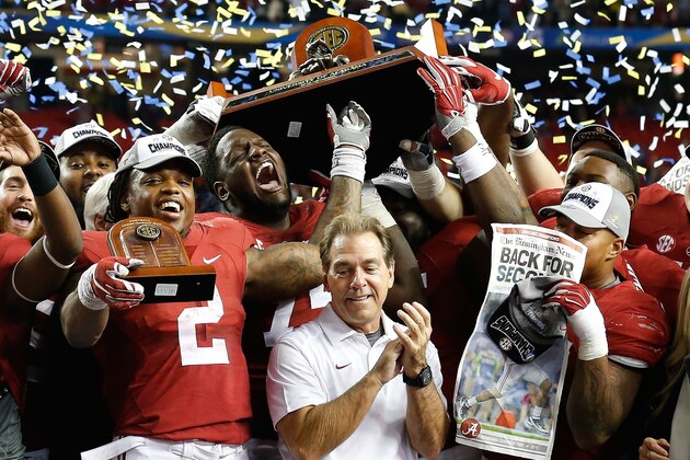ATLANTA, GA - DECEMBER 05:  Members of the Alabama Crimson Tide, including running back Derrick Henry #2 (front, left) and head coach Nick Saban (center) celebrate after the SEC Championship game against the Florida Gators at Georgia Dome on December 5, 2015 in Atlanta, Georgia.  (Photo by Mike Zarrilli/Getty Images)