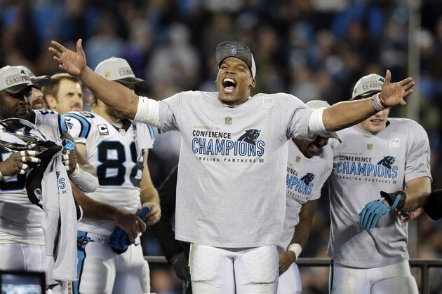 Carolina Panthers' Cam Newton celebrates after the NFL football NFC Championship game against the Arizona Cardinals, Sunday, Jan. 24, 2016, in Charlotte, N.C. The Panthers won 49-15 to advance to the Super Bowl. (AP Photo/Chuck Burton)