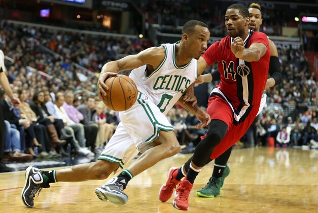 Jan 16, 2016; Washington, DC, USA; Boston Celtics guard Avery Bradley (0) drives baseline defended by Washington Wizards guard Gary Neal (14) during the game at Verizon Center. Mandatory Credit: Mitch Stringer-USA TODAY Sports