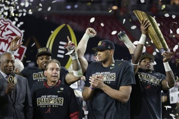 Alabama head coach Nick Saban, second from left, and players celebrate after the NCAA college football playoff championship game against Clemson Monday, Jan. 11, 2016, in Glendale, Ariz. Alabama won 45-40. (AP Photo/Chris Carlson)