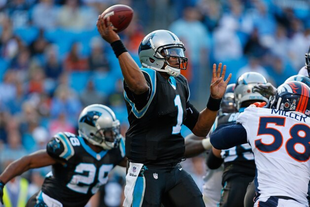 Carolina Panthers' Cam Newton (1) looks to pass as Denver Broncos' Von Miller (58) pushes in for a sack during the second half of an NFL football game in Charlotte, N.C., Sunday, Nov. 11, 2012. The Broncos won 36-14. (AP Photo/Bob Leverone)