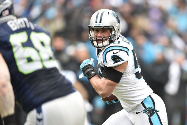 Jan 17, 2016; Charlotte, NC, USA; Carolina Panthers middle linebacker Luke Kuechly (59) returns an interception for a touchdown against the Seattle Seahawks in the first quarter of the NFC Divisional round playoff game at Bank of America Stadium. Mandatory Credit: Bob Donnan-USA TODAY Sports Jan 17, 2016; Charlotte, NC, USA; Carolina Panthers middle linebacker Luke Kuechly (59) returns an interception for a touchdown against the Seattle Seahawks in the first quarter of the NFC Divisional round playoff game at Bank of America Stadium. Mandatory Credit: Bob Donnan-USA TODAY Sports