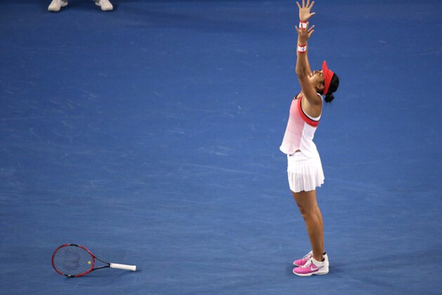 Zhang Shuai of China celebrates after defeating Varvara Lepchenko of the United States in their third round match at the Australian Open tennis championships in Melbourne, Australia, Saturday, Jan. 23, 2016.(AP Photo/Aaron Favila)