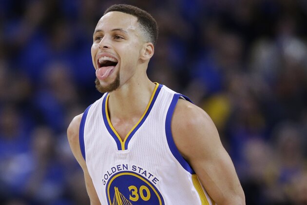Golden State Warriors' Stephen Curry (30) celebrates after scoring against the San Antonio Spurs during the second half of an NBA basketball game Monday, Jan. 25, 2016, in Oakland, Calif. (AP Photo/Marcio Jose Sanchez)