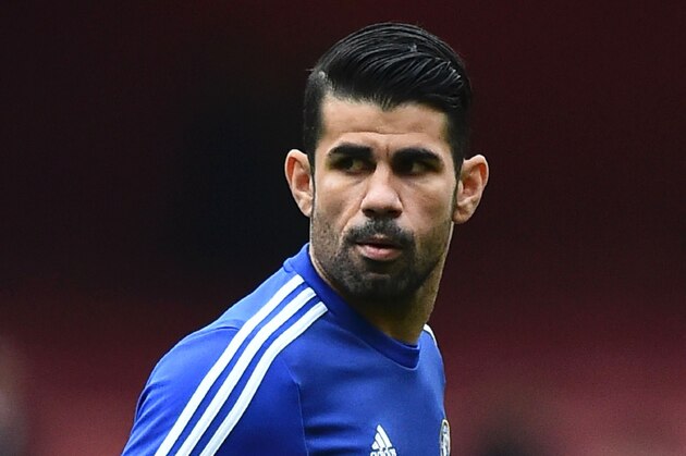 Chelsea's Brazilian-born Spanish striker Diego Costa warms up before the English Premier League football match between Arsenal and Chelsea at the Emirates Stadium in London on January 24, 2016. AFP PHOTO / BEN STANSALL

RESTRICTED TO EDITORIAL USE. No use with unauthorized audio, video, data, fixture lists, club/league logos or 'live' services. Online in-match use limited to 75 images, no video emulation. No use in betting, games or single club/league/player publications. / AFP / BEN STANSALL        (Photo credit should read BEN STANSALL/AFP/Getty Images)