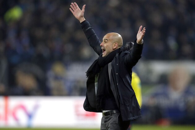 Bayern head coach Pep Guardiola shouts during the German Bundesliga soccer match between Hamburger SV and FC Bayern Munich in Hamburg, Germany, Friday, Jan. 22, 2016. (AP Photo/Michael Sohn)