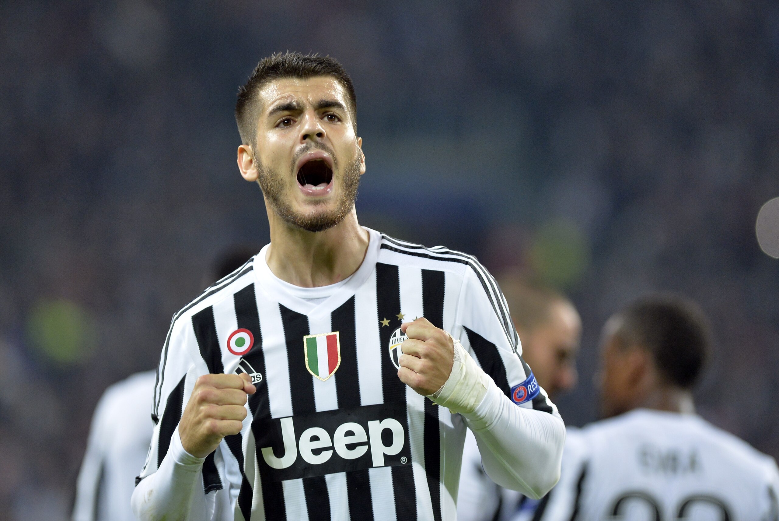 Juventus Alvaro Morata celebrates after he scored during the Champions League group D soccer match between Juventus and FC Sevilla, at the Juventus Stadium in Turin, Italy, Wednesday, Sept. 30, 2015. (AP Photo/Massimo Pinca)