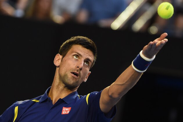 Serbia's Novak Djokovic serves during his men's singles match against Japan's Kei Nishikori on day nine of the 2016 Australian Open tennis tournament in Melbourne on January 26, 2016. AFP PHOTO / WILLIAM WEST ---IMAGE RESTRICTED TO EDITORIAL USE - STRICTLY NO COMMERCIAL USE / AFP / WILLIAM WEST        (Photo credit should read WILLIAM WEST/AFP/Getty Images)
