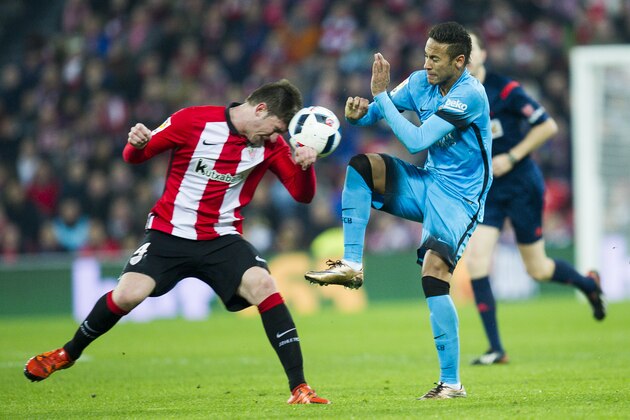 BILBAO, SPAIN - JANUARY 20:  Neymar of FC Barcelola duels for the ball with Aimeric Laporte of Athletic Club during the Copa del Rey Quarter Final First Leg match between Athletic Club and FC Barcelola at San Mames Stadium on January 20, 2016 in Bilbao, Spain.  (Photo by Juan Manuel Serrano Arce/Getty Images)
