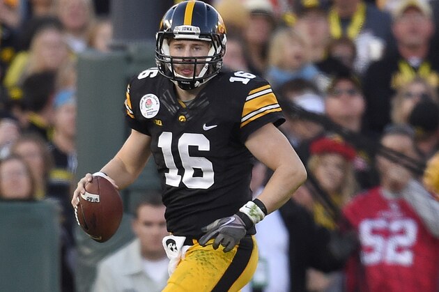 Iowa quarterback C.J. Beathard throws against Stanford during the first half of the Rose Bowl NCAA college football game, Friday, Jan. 1, 2016, in Pasadena, Calif. (AP Photo/Mark J. Terrill)