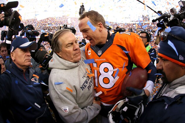 DENVER, CO - JANUARY 24:  Peyton Manning #18 of the Denver Broncos and head coach Bill Belichick of the New England Patriots speak after the AFC Championship game at Sports Authority Field at Mile High on January 24, 2016 in Denver, Colorado. The Broncos defeated the Patriots 20-18.  (Photo by Doug Pensinger/Getty Images)