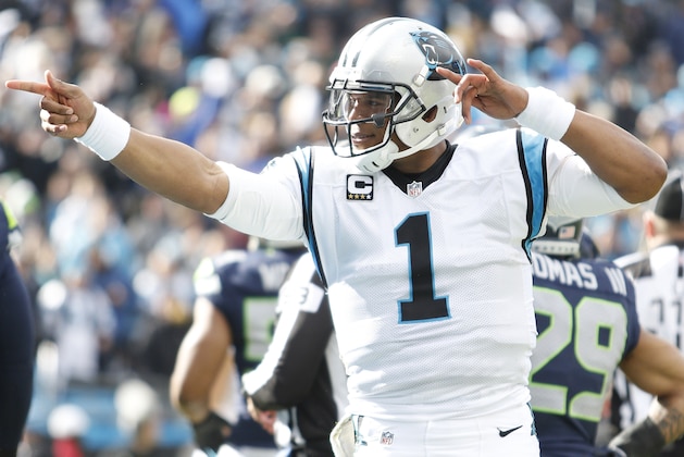 Carolina Panthers quarterback Cam Newton (1) signifies a first down against the Seattle Seahawks during the first half of an NFL divisional playoff football game, Sunday, Jan. 17, 2016, in Charlotte, N.C. (AP Photo/Bob Leverone)
