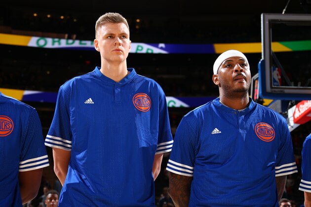 NEW YORK, NY - OCTOBER 7:  Kristaps Porzingis #6 of the New York Knicks and Carmelo Anthony #7 of the New York Knicks stand for the national anthem before a preseason game against Paschoalotto/Bauru on October 7, 2015 at Madison Square Garden in New York City, New York.  NOTE TO USER: User expressly acknowledges and agrees that, by downloading and or using this photograph, User is consenting to the terms and conditions of the Getty Images License Agreement. Mandatory Copyright Notice: Copyright 2015 NBAE  (Photo by Nathaniel S. Butler/NBAE via Getty Images)