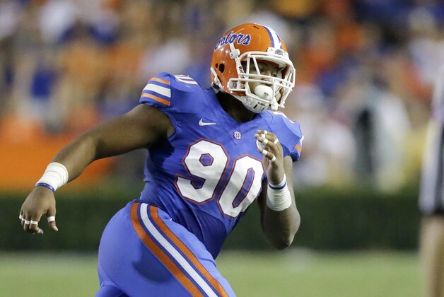 Florida defensive lineman Jonathan Bullard (90) rushes the New Mexico State line during the second half of an NCAA college football game, Saturday, Sept. 5, 2015, in Gainesville, Fla. Florida won 61-13. (AP Photo/John Raoux) Florida defensive lineman Jonathan Bullard (90) rushes the New Mexico State line during the second half of an NCAA college football game, Saturday, Sept. 5, 2015, in Gainesville, Fla. Florida won 61-13. (AP Photo/John Raoux)